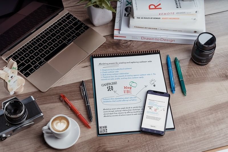 A desk with a Rocketbook Everlast