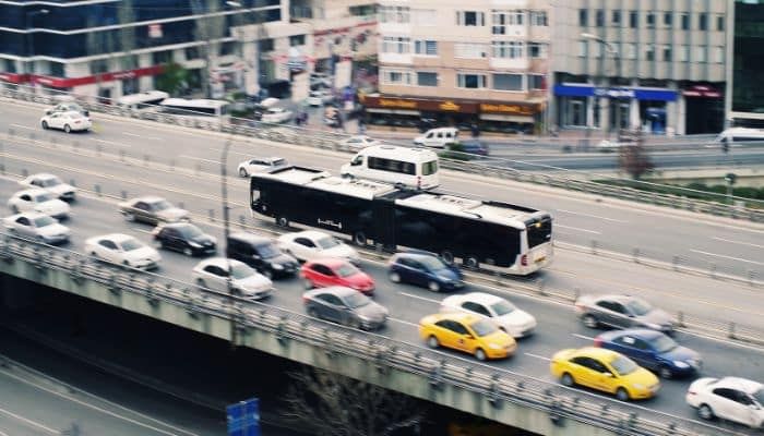 A bus and cars on a road in Derby