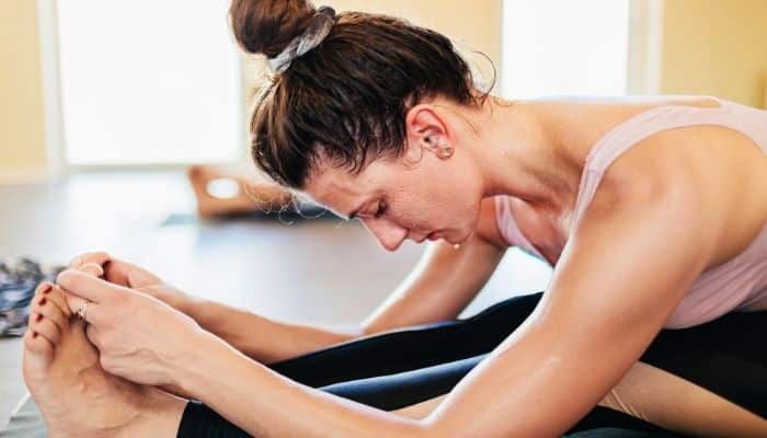 A female stretching her body