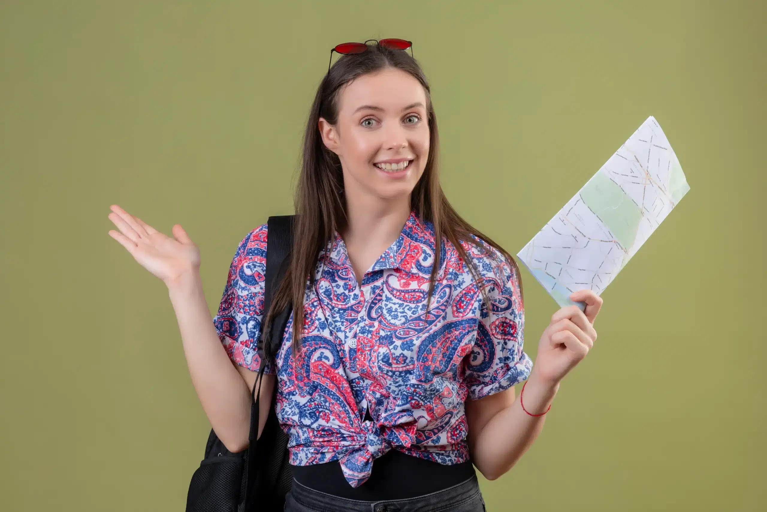 A girl holding a sheet indicating 